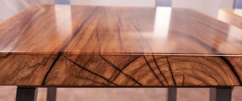 A finished wood table that's been imported into the U.S.