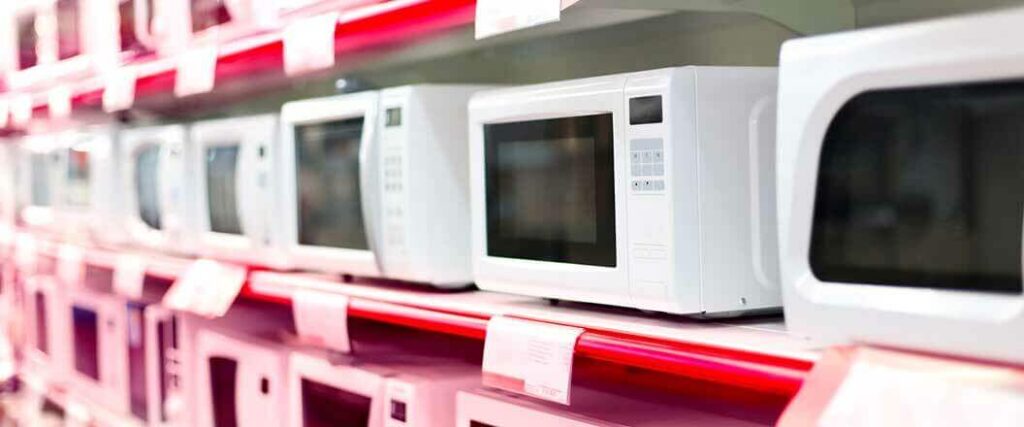 Store shelves with microwaves on it