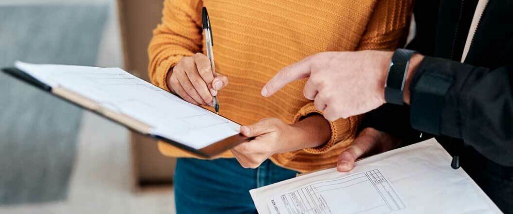 A customs broker explaining to an importer that they need an import license.