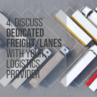 Aerial view of semi-trucks parked in a diagonal fashion