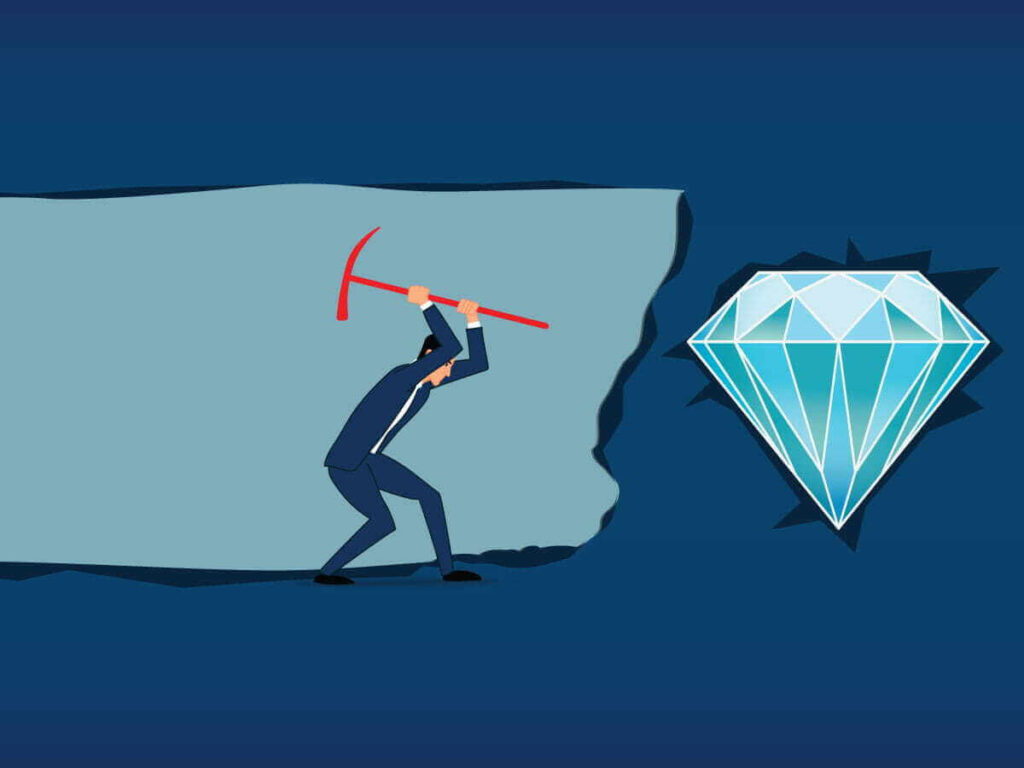 A man with a pickaxe mining through the earth with a diamond
