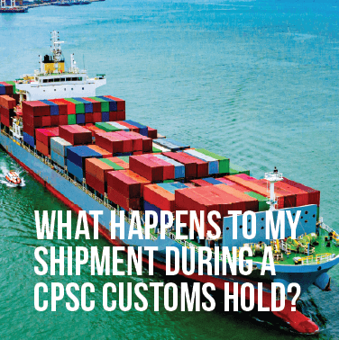 Front angle view of cargo vessel with shipping containers