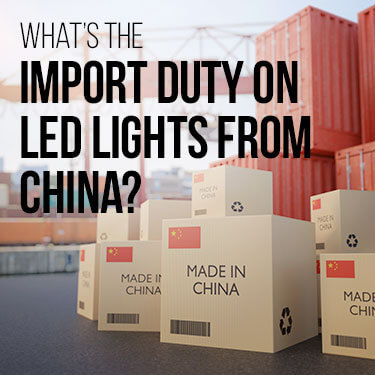 Stacks of boxes in a container yard reading "Made in China"