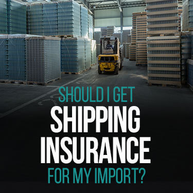 A forklift drives through a warehouse