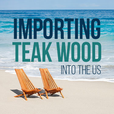 Two wooden chairs on the beach