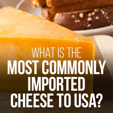 how to import cheese to usa with wedge of cheese and bread in the background