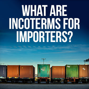 Trailers with cargo containers parked next to one another