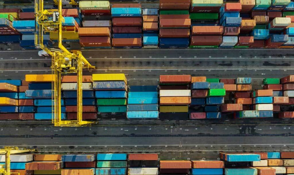 Aerial view of containers at a port terminal.