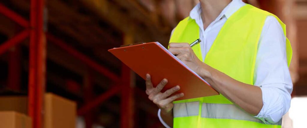 Customs hold inspector with a clipboard