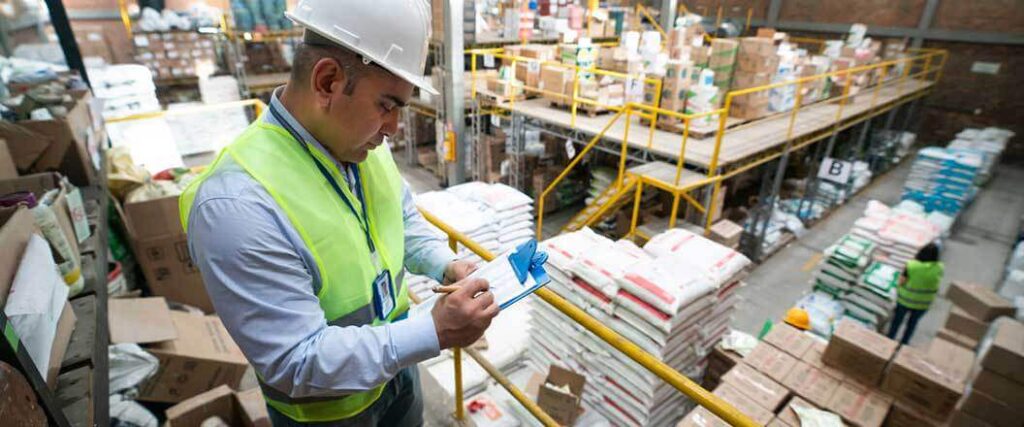 A CBP inspector noting customs penalties and violations.