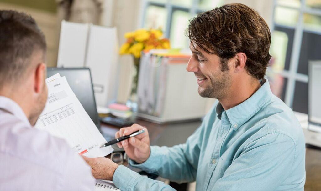 A customs broker talks with an importer about how to submit his ISF to CBP.