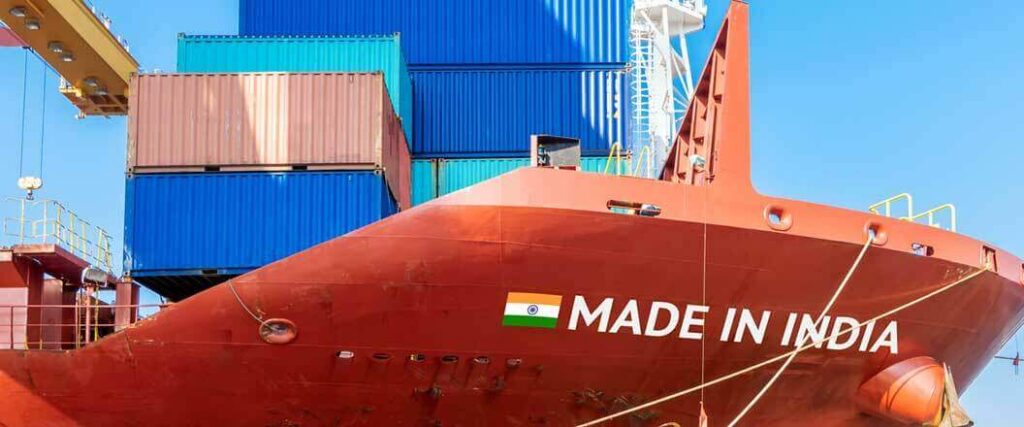 A cargo vessel with an Indian flag and the phrase "Made in India" printed on the hull.