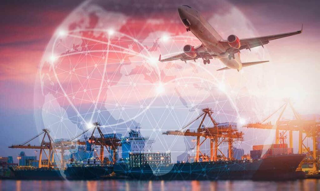 An airplane flying over an ocean port